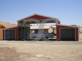 Raised Center Metal Barn | Vertical Roof | 48W x 21L x 12H |  Carolina Barn